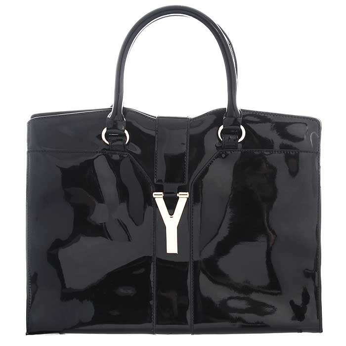 Сумка женская Fancy bag , цвет: черный. 131-1-04131-1-04 черн Сумка женская Fancy bag , цвет: черный. 131-1-04131-1-04 чернСтильная сумка Fancy Bag выполнена из искусственной лаковой кожи черного цвета. Сумка закрывается на застежку-молнию и сверху узким декоративным клапаном. Имеет одно отделение, содержащее внутри карман на застежке-молнии и два накладных открытых кармашка. Сумка оснащена двумя ручками, крепящимися при помощи металлических колец. В комплекте чехол для хранения. Этот стильный аксессуар станет изысканным дополнением к вашему образу. Характеристики: Цвет: черный. Материал: экокожа, металл, текстиль. Размер сумки: 37 см х 27,5 см х 17 см. Высота ручек: 17 см. Артикул: 131-1-04.
