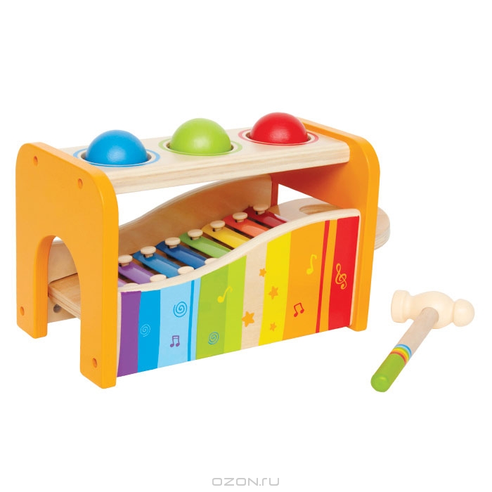 Музыкальный набор Hape, 6 элементовЕ0305 Музыкальный набор Hape, 6 элементовЕ0305Музыкальный набор Hape включает в себя деревянную основу, 3 деревянных шарика красного, зеленого и синего цветов, ксилофон и молоточек. Ксилофон снабжен разноцветными металлическими пластинками разной тональности и удобной ручкой, благодаря которой его легко вставить в основу и вытащить из нее. Сверху в основе находятся три отверстия, в которые нужно опустить шарики. Чтобы шарики провалились в отверстие, по ним нужно ударить молоточком. В нижней части основы находятся ворота, через которые шарики будут выкатываться. Возможны два варианта игры: бить молоточком по шарикам, они будут падать внутрь на ксилофон и в сопровождении веселых звуков выкатываться из ворот; ксилофон можно использовать отдельно, для этого его необходимо вытащить из деревянной основы и ударять молоточком по металлическим пластинкам. Музыкальный набор Hape поможет ребенку развить цветовое и звуковое восприятия, координацию движений, логическое мышление, понять причинно-следственные связи. Характеристики: ...