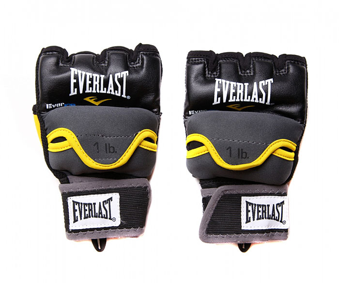 Перчатки гелевые Everlast Weighted Evergel с утяжелителем, 1 кг. Размер S/M4335GRSM Перчатки гелевые Everlast Weighted Evergel с утяжелителем, 1 кг. Размер S/M4335GRSMТренировочные боксерские перчатки, предназначенные как для работы со снарядами, так и для боя с тенью. Инновационная технология Evergel прекрасно амортизирует удары и защищает суставы пальцев. Обмотки с застежкой на липучке позволяют подогнать перчатки по размеру.