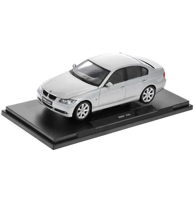 Модель автомобиля BMW 330i. Масштаб 1/18 - Welly12561 Модель автомобиля BMW 330i. Масштаб 1/18 - Welly12561Стильная модель автомобиля BMW 330i привлечет внимание не только ребенка, но и взрослого. Модель является точной уменьшенной копией известного автомобиля, у нее открываются передние двери, а также поднимаются капот и багажник. Колеса машинки поворачиваются вместе с рулем. Корпус машинки выполнен из металла, а шины из настоящей резины. Такая модель станет отличным подарком не только любителю автомобилей, но и человеку, ценящему оригинальность и изысканность, а качество исполнения представит такой подарок в самом лучшем свете.