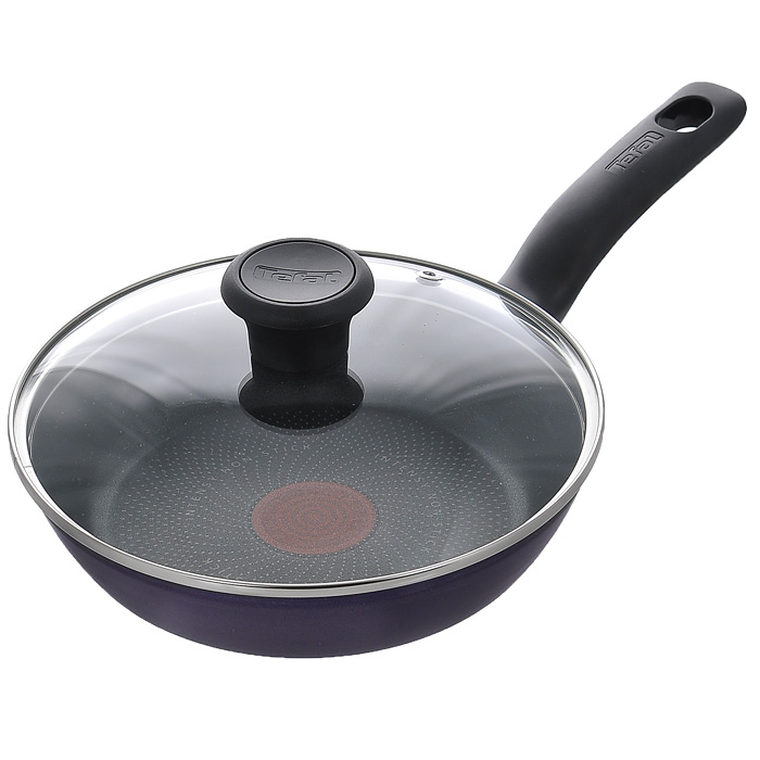 Сковорода Tefal Tendance, с антипригарным покрытием, с крышкой, цвет: Black Current (черная смородина). Диаметр 20 см040 81 400 Сковорода Tefal Tendance, с антипригарным покрытием, с крышкой, цвет: Black Current (черная смородина). Диаметр 20 см040 81 400Сковорода Tefal Tendance выполнена из высококачественного алюминия с антипригарным покрытием. Основные достоинства предлагаемой сковороды: - индикатор нагрева ThermoSpot показывает, когда ваша сковорода нагрета до оптимальной температуры, обеспечивая высокое качество приготовления пищи; - внутреннее покрытие обладает отличными антипригарными свойствами, не содержит PFOA, свинца и кадмия; - дно с технологией Durabase Technology обеспечивает равномерный нагрев сковороды; - изысканное внешнее покрытие цвета черной смородины; - эргономичная пластиковая ручка; - крышка из термостойкого стекла и с ободком из нержавеющей стали; - подходит для газовых, электрических, стеклокерамических плит, не подходит для индукционных плит; - можно мыть в посудомоечной машине. Со сковородой Tefal Tendance вы всегда будете готовить вкусную и полезную пищу. Она незаменима при жарке и тушении. Посуда торговой марки Tefal...