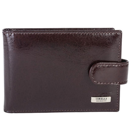 Футляр для карточек Tirelli Мелоди, цвет: шоколад. 15-316-1015-316-10 Футляр для карточек Tirelli Мелоди, цвет: шоколад. 15-316-1015-316-10Футляр для карточек Tirelli Мелоди изготовлен из натуральной кожи шоколадного цвета с глянцевой текстурой. Футляр закрывается хлястиком на кнопку, оформлен фирменным логотипом. Внутри имеется 8 двусторонних кармашков из прозрачного пластика для хранения пластиковых карт, визиток, дисконтных карт и т. п. На внутренней стороне обложки с двух сторон имеются по 2 дополнительных прорезных кармашка. Такой футляр не только поможет сохранить внешний вид ваших документов и защитит их от повреждений, но и станет ярким аксессуаром, который подчеркнет ваш образ. Изделие упаковано в подарочную коробку синего цвета с логотипом фирмы Tirelli. Характеристики: Материал: натуральная кожа, текстиль, пластик. Цвет: шоколад. Размер футляра (в сложенном виде): 10 см х 7 см. Размер упаковки: 13 см х 8,5 см х 2,5 см. Артикул: 15-316-10.
