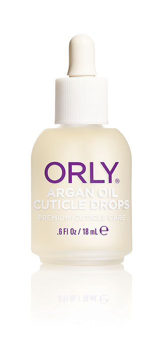 Orly Капли для кутикулы Argan Oil Cuticle Drops с аргановым маслом, 18 мл24500 Orly Капли для кутикулы Argan Oil Cuticle Drops с аргановым маслом, 18 мл24500Средство Orly Argan Oil Cuticle Drops разработано на основе уникального масла арганы, которое на 80% состоит из ненасыщенных жирных кислот. Также в его состав входят антиоксиданты и витамины А, Е. Входящие в состав компоненты способствуют снятию воспаления и быстрому восстановлению сухой обезвоженной кутикулы, интенсивно питают и возвращают ногтям здоровый ухоженный вид. Средством легко пользоваться, так как оно имеет удобный пузырек, обеспечивающий капельное нанесение. Способ применения : нанести небольшое количество масла на зону кутикулы и втереть массажными движениями в кожу вокруг ногтя. Рекомендовано для ежедневного использования.