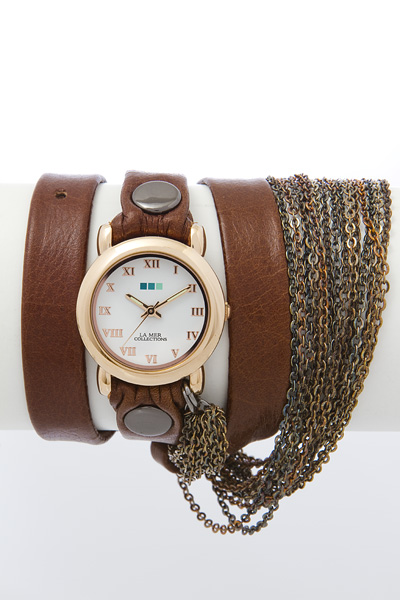 Часы наручные женские La Mer Collections Chain Prague Brown. LMMULTI2001xLMMULTI2001x Часы наручные женские La Mer Collections Chain Prague Brown. LMMULTI2001xLMMULTI2001xЧасы оснащены японским кварцевым механизмом. Корпус круглой формы выполнен из нержавеющей стали золотистого цвета. Оригинальный кожаный ремешок коричневого цвета отделан металлическими клепками и дополнен связкой цепочек. Каждая модель женских наручных часов La Mer Collections имеет эксклюзивный дизайн, в основу которого положено необычное сочетание классических циферблатов с удлиненными кожаными ремешками. Оборачиваясь вокруг запястья несколько раз, они образуют эффект кожаного браслета, превращая часы в женственный аксессуар, который великолепно дополнит другие аксессуары и весь образ в целом. Дизайн La Mer Collections отвечает всем последним тенденциям моды и превосходно сочетается с модными сумками, ремнями, обувью и другими элементами гардероба современных девушек. Часы La Mer - это еще и отличный подарок любимой девушке, сестре или подруге на день рождения, восьмое марта или новый год!