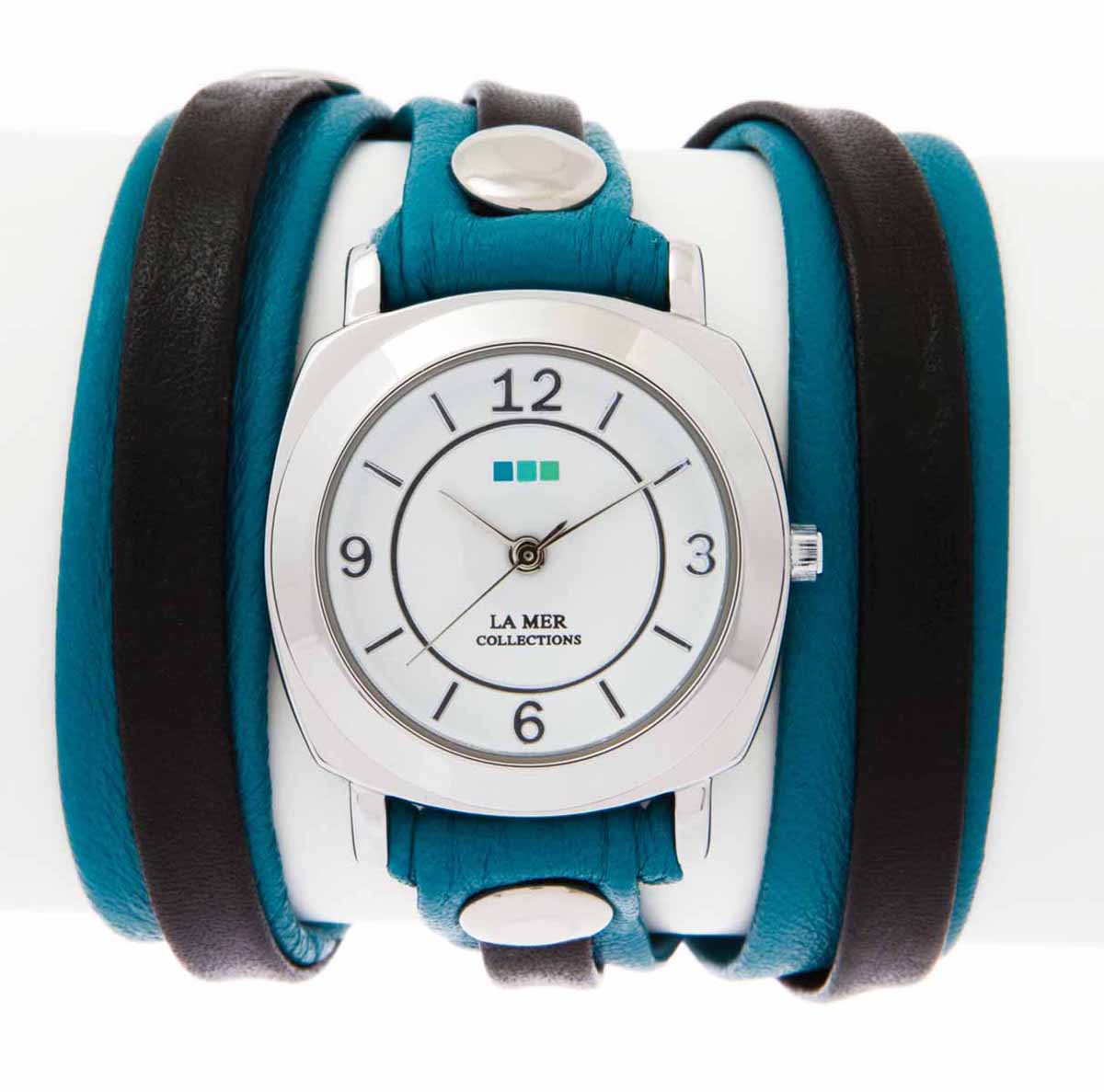 Часы наручные женские La Mer Collections Layer Odyssey Aqua Blackd. LMODYLY004LMODYLY004 Часы наручные женские La Mer Collections Layer Odyssey Aqua Blackd. LMODYLY004LMODYLY004Часы оснащены японским кварцевым механизмом. Корпус круглой формы выполнен из нержавеющей стали серебристого цвета. Оригинальный кожаный ремешок черного и зеленого цветов отделан металлическими клепками. Каждая модель женских наручных часов La Mer Collections имеет эксклюзивный дизайн, в основу которого положено необычное сочетание классических циферблатов с удлиненными кожаными ремешками. Оборачиваясь вокруг запястья несколько раз, они образуют эффект кожаного браслета, превращая часы в женственный аксессуар, который великолепно дополнит другие аксессуары и весь образ в целом. Дизайн La Mer Collections отвечает всем последним тенденциям моды и превосходно сочетается с модными сумками, ремнями, обувью и другими элементами гардероба современных девушек. Часы La Mer - это еще и отличный подарок любимой девушке, сестре или подруге на день рождения, восьмое марта или новый год! Характеристики: Механизм: кварцевый SEIKO (Япония). Размер корпуса: 29...