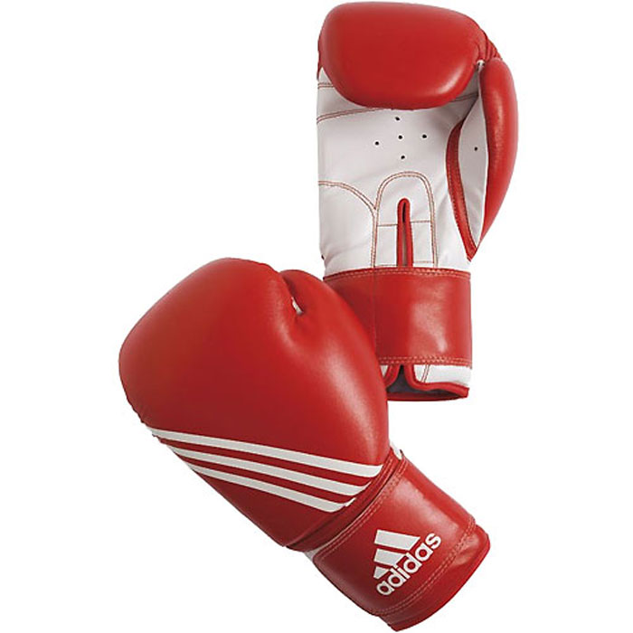 Перчатки боксерские Adidas Training, цвет: красно-белый. adiBT02. Вес 8 унцийadiBT02 Перчатки боксерские Adidas Training, цвет: красно-белый. adiBT02. Вес 8 унцийadiBT02Боксерские перчатки Adidas Training изготовлены из мягкого полиуретана PU3G, который по своим качествам не уступает натуральной коже. Внутренний наполнитель из многослойной пены закрывает тыльную сторону и боковую часть ладони, обеспечивая надежную защиту рук боксера и позволяя безопасно тренироваться в полную силу. Предварительно изогнутый по технологии Intelligent Mould Technology крой перчатки позволяет боксеру держать кулак в правильном положении. Загнутый параллельно кулаку большой палец обеспечивает безопасность при нанесении ударов и защищает большой палец от вывихов и травм. Внутренняя подкладка и вентиляционные отверстия на ладони создают максимальный уровень комфорта для рук, поддерживая оптимальный микроклимат внутри перчаток. Широкий ремень, охватывая запястье, полностью оборачивается вокруг манжеты, благодаря чему создается дополнительная защита лучезапястного сустава от травмирования. Застежка на липучке способствует быстрому и удобному одеванию перчаток, плотно...