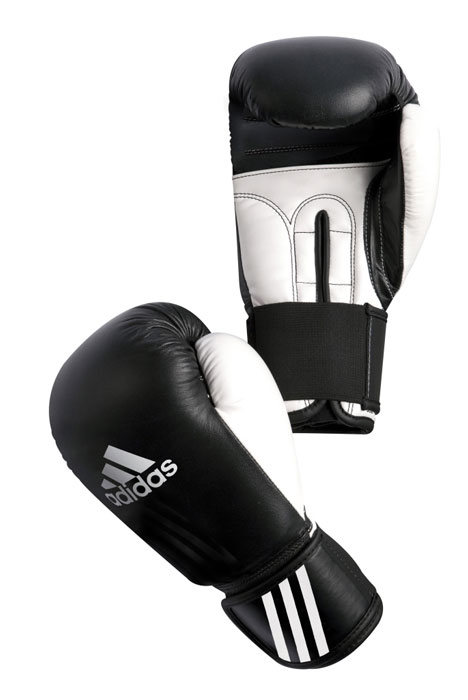 Перчатки боксерские Adidas Performer, цвет: черно-белый. adiBCO1. Вес 8 унцийadiBCO1 Перчатки боксерские Adidas Performer, цвет: черно-белый. adiBCO1. Вес 8 унцийadiBCO1Боксерские перчатки Adidas Performer для отработок ударов и комбинаций. Тыльная сторона в перчатках выполнена из прочной, износостойкой, натуральной кожи. Большой палец и ладонь изготовлены из износостойкого полиуретана. Внутренний наполнитель из формованной под давлением пены с интегрированной внутренней вставкой из геля, выполненной по технологии I-Protech. Внутренний наполнитель покрывает тыльную сторону, создавая надежную защиту рук и давая боксеру возможность безопасно тренироваться в полную силу. Внутренняя подкладка, выполненная из дышащего материала, и вентиляционное отверстие на ладони создают комфортный микроклимат внутри перчаток. Эластичный ремешок с фиксацией на липучке позволяет быстро одеть и снять перчатки.