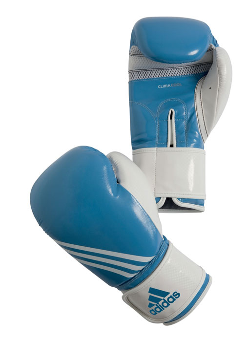 Перчатки боксерские Adidas Fitness, цвет: бело-голубой. adiBL05. Вес 10 унцийadiBL05 Перчатки боксерские Adidas Fitness, цвет: бело-голубой. adiBL05. Вес 10 унцийadiBL05Боксерские перчатки Adidas Fitness изготовлены из искусственной кожи с отделкой внутренней области пальцев. Тренировочная модель. Гелиевая набивка. Фиксация манжеты с помощью эластичной застежки велкро. Система ClimaCool - микровентиляция, способствует полному удалению внутренней влаги.