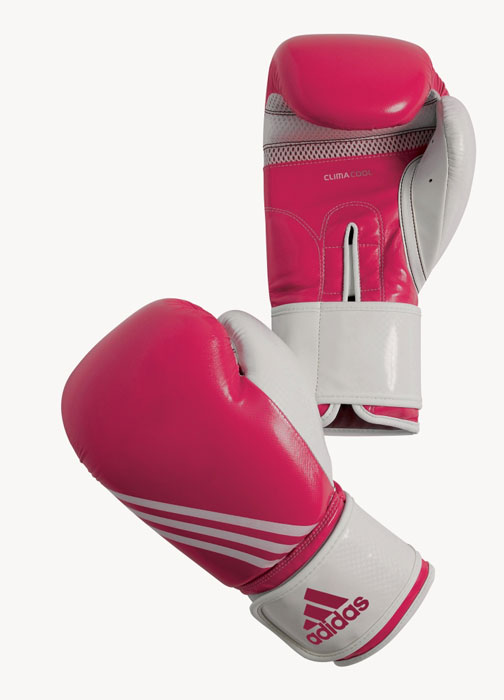 Перчатки боксерские Adidas Fitness, цвет: розово-белый. adiBL05. Вес 12 унцийadiBL05 Перчатки боксерские Adidas Fitness, цвет: розово-белый. adiBL05. Вес 12 унцийadiBL05Боксерские перчатки Adidas Fitness изготовлены из искусственной кожи с отделкой внутренней области пальцев. Тренировочная модель. Гелиевая набивка. Фиксация манжеты с помощью эластичной застежки велкро. Система ClimaCool - микровентиляция, способствует полному удалению внутренней влаги.