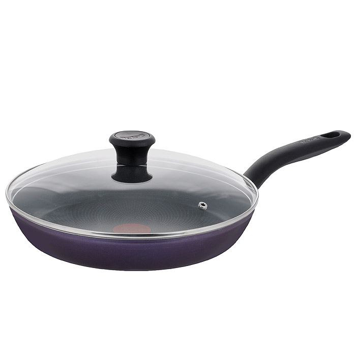 Сковорода Tefal Tendance с крышкой, с антипригарным покрытием, цвет: Black Current (черная смородина). Диаметр 28 см040 81 430 Сковорода Tefal Tendance с крышкой, с антипригарным покрытием, цвет: Black Current (черная смородина). Диаметр 28 см040 81 430Сковорода Tefal Tendance выполнена из высококачественного алюминия с антипригарным покрытием Intensy. Покрытие обладает превосходными антипригарными свойствами, не содержит PFOA, свинца и кадмия. Эргономичная ручка сковороды выполнена из бакелита. Внешнее антипригарное покрытие сковороды цвета черной смородины смотрится очень эффектно. Индикатор нагрева Thermo-Spot станет равномерно красным, когда посуда разогреется до оптимальной температуры 180°С градусов. Таким образом, вы будете в курсе того, что можно начинать готовить. Крышка из термостойкого стекла снабжена металлическим ободком и отверстием для выпуска пара. Дно с технологией Diffusial обеспечивает равномерное распределение тепла. Сковорода подходит для всех типов плит, кроме индукционных. Можно мыть в посудомоечной машине.