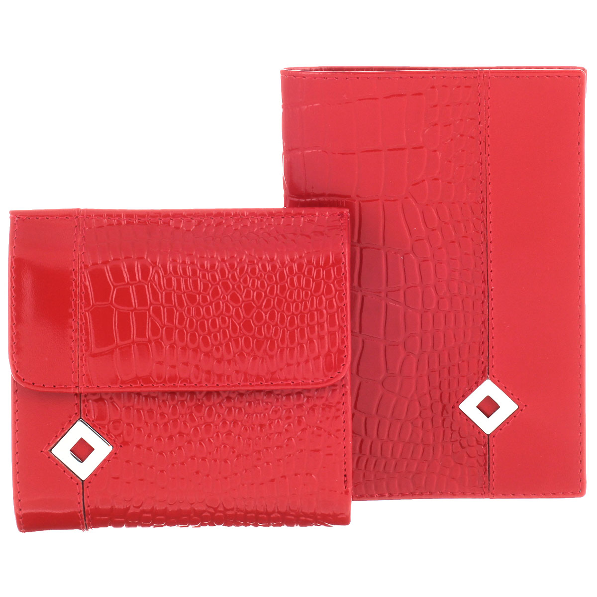 Подарочный набор Dimanche Papillon Rouge: обложка для паспорта, кошелек, цвет: красный. 101/05101/05 Подарочный набор Dimanche Papillon Rouge: обложка для паспорта, кошелек, цвет: красный. 101/05101/05Изысканный набор Dimanche Papillon Rouge состоит из обложки для паспорта и кошелька. Обе модели изготовлены из высококачественной натуральной кожи и декорированы тиснением под кожу рептилии, а также металлической пластиной в форме ромба на лицевой стороне. Обложка для паспорта с внутренней стороны отделана атласным текстилем. Внутри - два прозрачных боковых кармана из пластика, которые обеспечат надежную фиксацию вашего документа. Кошелек с обеих сторон закрывается хлястиками на кнопки. Внутри - два отделения для купюр, врезной карман на молнии, три боковых кармана (один - с окошком из прозрачного пластика) и три прорези (одна предназначена для SIM-карты). Лицевая сторона изделия дополнена отсеком для мелочи. Набор упакован в стильные фирменные коробки. Роскошный набор Dimanche Papillon Rouge подчеркнет вашу индивидуальность и безупречный вкус, а также станет замечательным подарком человеку, ценящему качественные и практичные вещи.