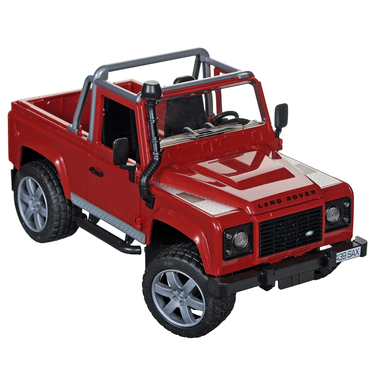 Bruder Внедорожник Land Rover Defender02-591 Bruder Внедорожник Land Rover Defender02-591Внедорожник Bruder Land Rover Defender, выполненный из прочного безопасного материала, отлично подойдет ребенку для различных игр. Машина является уменьшенной копией внедорожника фирмы Land Rover Defender без крыши. С левой стороны проходит выхлопная труба. Капот поднимается и крюком фиксируется в верхнем положении. Задний борт опускается. Задние сиденья снимаются, и внедорожник превращается в удобный автомобиль для перевозки грузов. Передняя и задняя оси оснащены амортизаторами. Также внедорожник оснащен фаркопом. Двери водителя и пассажира открываются и снимаются. В салон помещается небольшая фигурка или игрушка. Передние колеса поворачиваются рулем. Кроме этого, в наборе прилагается дополнительный руль (расположен на днище автомобиля), которым через крышу можно управлять колесами внедорожника. Прорезиненные колеса обеспечивают машине устойчивость и хорошую проходимость. Порадуйте своего ребенка таким замечательным подарком!