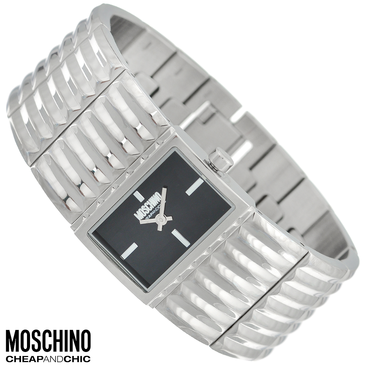 Часы женские наручные Moschino, цвет: серебристый. MW0364MW0364 Часы женские наручные Moschino, цвет: серебристый. MW0364MW0364Наручные часы от известного итальянского бренда Moschino - это не только стильный и функциональный аксессуар, но и современные технологи, сочетающиеся с экстравагантным дизайном и индивидуальностью. Часы Moschino оснащены кварцевым механизмом. Корпус выполнен из высококачественной нержавеющей стали. Циферблат с отметками украшен логотипом бренда и защищен минеральным стеклом. Часы имеют две стрелки - часовую и минутную. Широкий браслет часов выполнен из нержавеющей стали и оснащен застежкой-клипсой. Часы упакованы в фирменную металлическую коробку с логотипом бренда. Часы Moschino благодаря своему уникальному дизайну отличаются от часов других марок своеобразными циферблатами, функциональностью, а также набором уникальных технических свойств. Каждой модели присуща легкая экстравагантность, самобытность и, безусловно, великолепный вкус. Характеристики: Размер циферблата: 2,3 см х 1,5 см. Размер корпуса: 2,8 см х 2 см х 0,7...