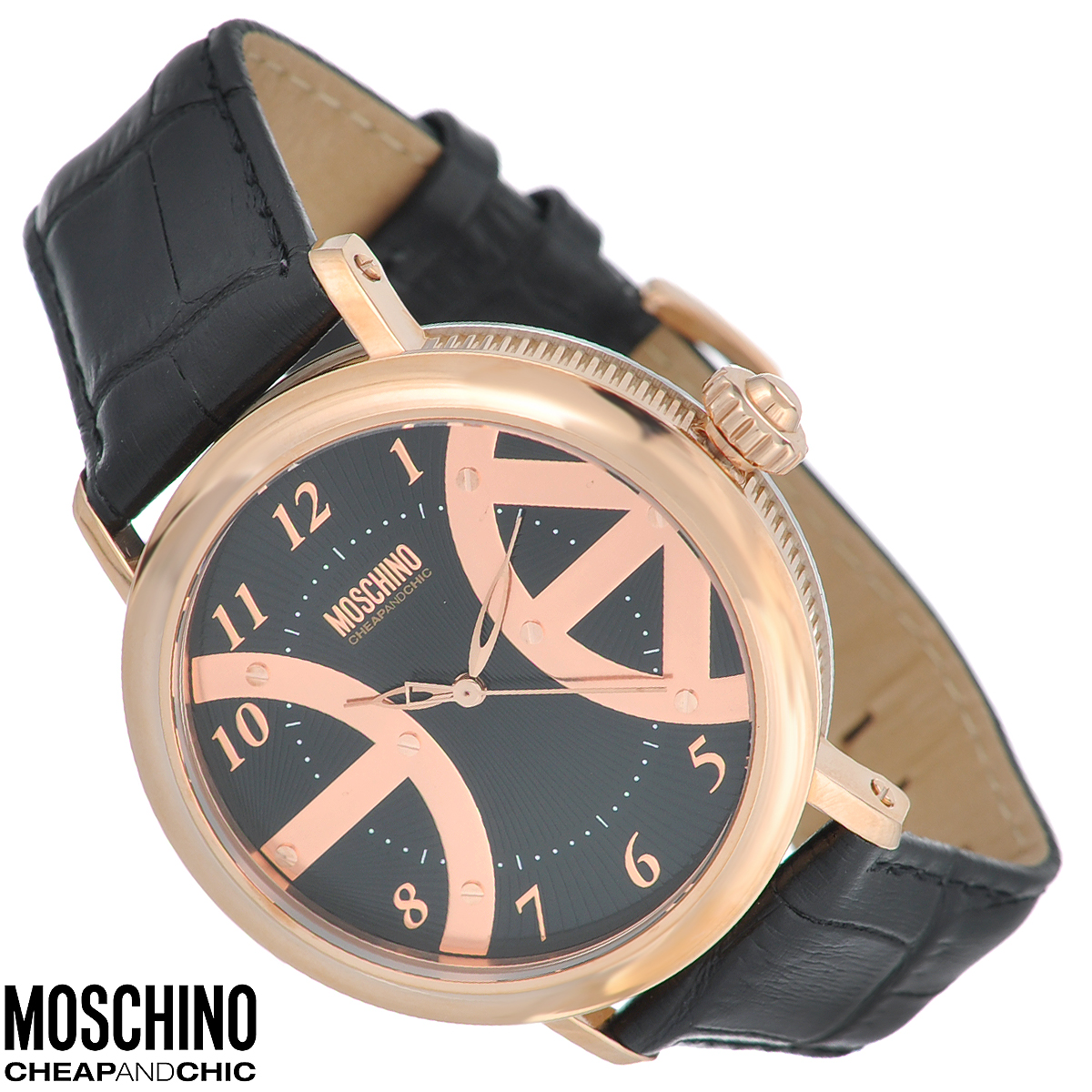 Часы наручные Moschino, цвет: черный, золотой. MW0240MW0240 Часы наручные Moschino, цвет: черный, золотой. MW0240MW0240Наручные часы от известного итальянского бренда Moschino - это не только стильный и функциональный аксессуар, но и современные технологи, сочетающиеся с экстравагантным дизайном и индивидуальностью. Часы Moschino оснащены кварцевым механизмом. Корпус выполнен из высококачественной нержавеющей стали с PVD-покрытием. Циферблат с арабскими цифрами оформлен металлическими декоративными элементами и защищен минеральным стеклом. Часы имеют три стрелки - часовую, минутную и секундную. Ремешок часов выполнен из натуральной кожи с тиснением и оснащен классической застежкой. Часы упакованы в фирменную металлическую коробку с логотипом бренда. Часы Moschino благодаря своему уникальному дизайну отличаются от часов других марок своеобразными циферблатами, функциональностью, а также набором уникальных технических свойств. Каждой модели присуща легкая экстравагантность, самобытность и, безусловно, великолепный вкус. Характеристики: Диаметр...