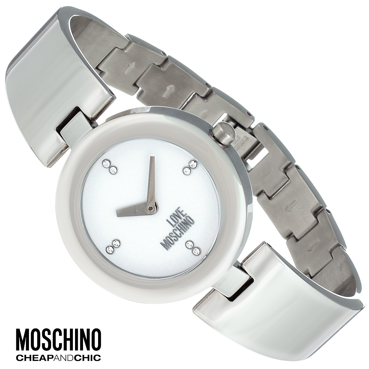 Часы женские наручные Moschino, цвет: серебристый. MW0423MW0423 Часы женские наручные Moschino, цвет: серебристый. MW0423MW0423Наручные часы от известного итальянского бренда Moschino - это не только стильный и функциональный аксессуар, но и современные технологи, сочетающиеся с экстравагантным дизайном и индивидуальностью. Часы Moschino оснащены кварцевым механизмом. Корпус выполнен из высококачественной нержавеющей стали. Циферблат оформлен отметками из страз, надписью Love Moschino защищен минеральным стеклом. Часы имеют две стрелки - часовую и минутную. Браслет часов выполнен из нержавеющей стали и оснащен ювелирной застежкой. Часы упакованы в фирменную металлическую коробку с логотипом бренда. Часы Moschino благодаря своему уникальному дизайну отличаются от часов других марок своеобразными циферблатами, функциональностью, а также набором уникальных технических свойств. Каждой модели присуща легкая экстравагантность, самобытность и, безусловно, великолепный вкус. Характеристики: Диаметр циферблата: 2,5 см. Размер корпуса: 3,3 см х 4 см х 0,7...