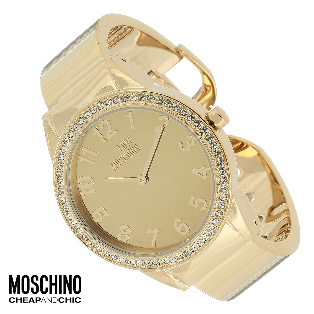 Часы женские наручные Moschino, цвет: золотой. MW0441MW0441 Часы женские наручные Moschino, цвет: золотой. MW0441MW0441Наручные часы от известного итальянского бренда Moschino - это не только стильный и функциональный аксессуар, но и современные технологи, сочетающиеся с экстравагантным дизайном и индивидуальностью. Часы Moschino оснащены кварцевым механизмом. Корпус выполнен из высококачественной нержавеющей стали с PVD-покрытием и по контуру циферблата оформлен стразами. Циферблат оформлен арабскими цифрами, надписью Love Moschino и защищен минеральным стеклом. Часы имеют две стрелки - часовую и минутную. Браслет часов выполнен из нержавеющей стали и имеет разъемную конструкцию. Часы упакованы в фирменную металлическую коробку с логотипом бренда. Часы Moschino благодаря своему уникальному дизайну отличаются от часов других марок своеобразными циферблатами, функциональностью, а также набором уникальных технических свойств. Каждой модели присуща легкая экстравагантность, самобытность и, безусловно, великолепный вкус. Характеристики: Диаметр...