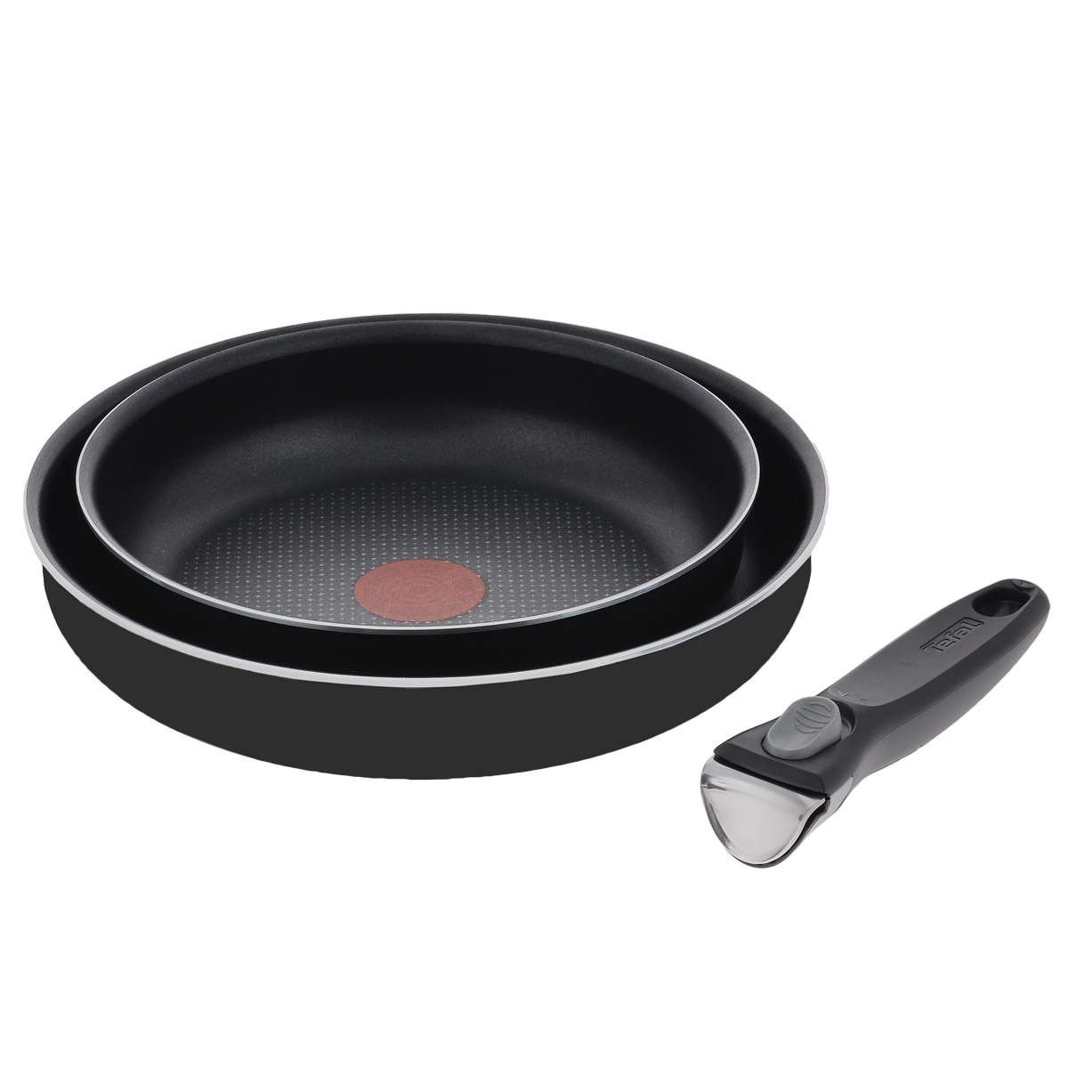 Набор сковородок Tefal Ingenio, с антипригарным покрытием, со съемной ручкой, цвет: черный, 3 предмета. 2000026307Э 04131810 Набор сковородок Tefal Ingenio, с антипригарным покрытием, со съемной ручкой, цвет: черный, 3 предмета. 2000026307Э 04131810Набор Tefal Ingenio состоит из двух сковородок и съемной ручки. Сковороды выполнены из алюминия с внутренним усовершенствованным антипригарным покрытием Resist +. Уникальная посуда занимает минимум места и дарит вам максимум возможностей! Все дело в съемной ручке из бакелита со вставками из нержавеющей стали - с ней вы сможете готовить разнообразные блюда, используя небольшой набор посуды. Благодаря такой ручке посуда компактна и складывается по принципу матрешки. Основные преимущества: - Мгновенное распределение тепла, устойчивость к деформации, - Индикатор нагрева Thermo-Spot становится равномерно красным при достижении оптимальной температуры, - Компактность, - Уникальные лучики на дне для оптимального распределения тепла, - Запекание продуктов в духовке. Можно мыть в посудомоечной машине. Подходит для всех типов плит, кроме индукционных. Диаметр сковородок: 22 см, 26 см. Длина ручки: 17 см. ...
