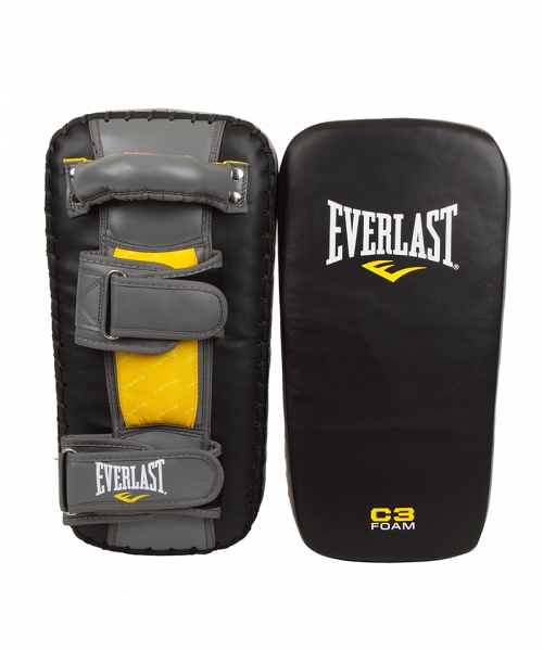 Макивары Everlast Pro Leather Thai, цвет: черный714501 Макивары Everlast Pro Leather Thai, цвет: черный714501Макивара Everlast Pro Leather Thai изготовлена в аутентичном Муай Тай дизайне с применением уникального пенного наполнителя C3 Foam, благодаря чему обеспечивает максимальную степень безопасности при отработке ударов руками, ногами, коленом и локтем. В то же время, благодаря конической форме, оставляет большую свободу для маневрирования для работы с несколькими целями и разными ударными зонами. Макивара снабжена тремя ручками, каждая из которых дополнительно усилена заклепками. Две ручки снабжены широкими застежками на липучках для более жесткой фиксации на руке. Зона крепления снабжена дополнительным защитным слоем с покрытием EverDri, которое активно борется с потом, что значительно повышает степень удобства при использовании, одновременно снижая риск получить травму. Everlast Pro Leather Thai сшита из натуральной высококачественной кожи, что гарантирует значительный запас прочности и высокую износоустойчивость.
