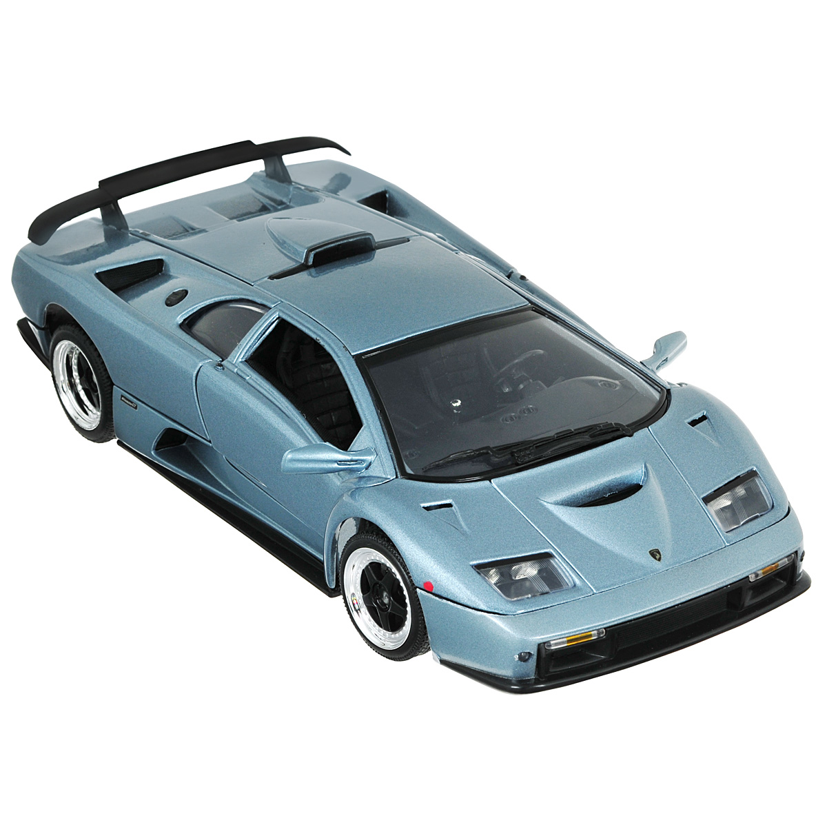 MotorMax Модель автомобиля Lamborghini Diablo GT цвет серыйgrey_metallic/ast73168 MotorMax Модель автомобиля Lamborghini Diablo GT цвет серыйgrey_metallic/ast73168Коллекционная модель MotorMax Lamborghini Diablo GT станет хорошим подарком для любого ценителя автомобилей. В мире существует всего 80 экземпляров этого итальянского суперкара, впервые увидевшего свет в 1999 году и до сих пор приковывающего к себе внимание. Вступите в элитный клуб владельцев Lamborghini Diablo GT, украсив свою коллекцию великолепной моделью в масштабе 1:18 от MotorMax. Модель максимально точно соответствует своему прототипу: открываются двери крыло бабочки и багажник. Машинка изготовлена из литого металла (Die Cast), для декорирования использованы пластиковые элементы. Колеса, поворачивающиеся при кручении руля, обуты в резиновые шины. Модель помещена на пластиковую подставку с оригинальным названием машины. Эта игрушка станет великолепным подарком для коллекционера. Она упакована в премиальную упаковку, что делает внешний вид машинки презентабельным.