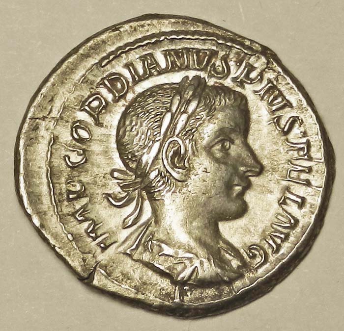 Монета денарий. Гордиан III, 241-243 гг. Белый металл. Античный Рим304329 Монета денарий. Гордиан III, 241-243 гг. Белый металл. Античный Рим304329Монета денарий. Гордиан III, 241-243 гг. Ag. Античный Рим. Диаметр 2,1 см. Аверс: профильный портрет императора, круговая легенда IMP GORDIANVS PIVS FEL AVG. Реверс: Юпитер стоит прямо, голова направо, держит скипетр и молнии. Круговая легенда IOVIS STATOR. Гурт гладкий. Соотношение осей аверса и реверса: 12. Сохранность очень хорошая. Красивая патина.