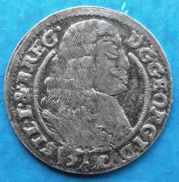 Монета 3 крейцера. Силезия-Лигниц-Бриг (Польша-Германия), 1662 год. Георг304329 Монета 3 крейцера. Силезия-Лигниц-Бриг (Польша-Германия), 1662 год. Георг304329Монета 3 крейцера. Австрия, 1703 год, Георг. Ag. Диаметр 2 см. Аверс: профильный портрет монарха, повернутый вправо, круговая легенда SIL.I.&BREG D GEORG I DUX. Реверс: герб, круговая легенда ARGENT 1662 MONETA NOVA ( ). Соотношение осей аверса и реверса: 12. Чекан: Силезия-Лигниц-Бриг. Сохранность очень хорошая (VF). Красивая патина.