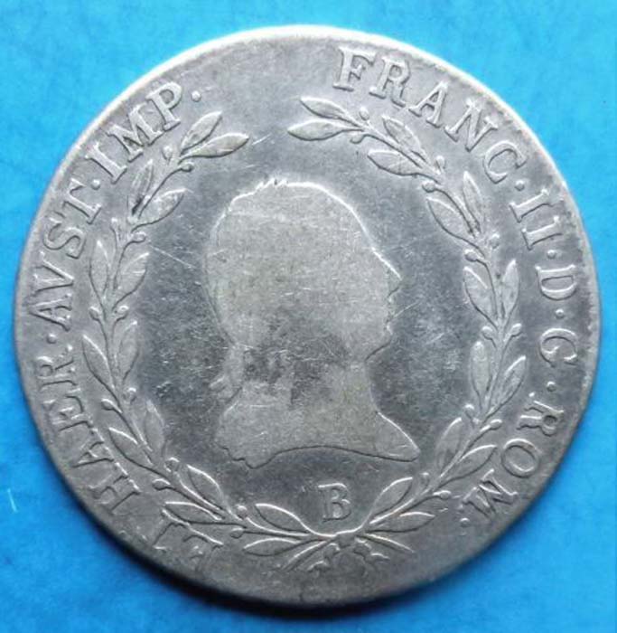 Монета 20 крейцеров, 1806 год. Австро-Венгрия, Кремниц (B), Франц IIK421306 Монета 20 крейцеров, 1806 год. Австро-Венгрия, Кремниц (B), Франц IIK421306Монета 20 крейцеров, 1806 год. Австро-Венгрия, Кремниц (B), Франц II. Ag. Диаметр 2,8 см. Аверс: профильный портрет монарха, повернутый вправо, круговая легенда ET HAER.AVST.IMP.FRANC.II.D.G.ROM.. Под профилем литера B - монетный двор в Кремнице. Реверс: Герб под короной, круговая легенда и обозначение номинала - 20, легенда D.LOTH.VEN.SAL.1806.GER.HVN.BOH.REX.A.A.. Соотношение осей аверса и реверса: 12. Монетный двор B (Кремниц). Сохранность очень хорошая (VF). Красивая патина.