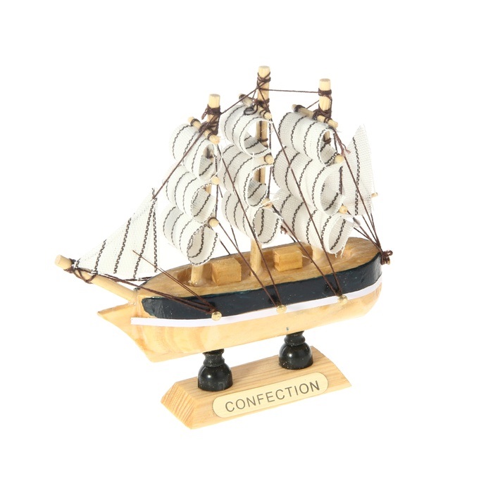 Корабль сувенирный Confection, длина 10 см. 805882805882 Корабль сувенирный Confection, длина 10 см. 805882805882Сувенирный корабль Confection, изготовленный из дерева и текстиля, это великолепный элемент декора рабочей зоны в офисе или кабинете. Корабль с парусами помещен на деревянную подставку. Время идет, и мы становимся свидетелями развития технического прогресса, новых учений и практик. Но одно не подвластно времени - это любовь человека к морю и кораблям. Сувенирный корабль наполнен историей и силой океанских вод. Данная модель кораблика станет отличным подарком для всех любителей морей, поклонников историй о покорении океанов и неизведанных земель. Модель корабля - подарок со смыслом. Издавна на Руси считалось, что корабли приносят удачу и везение. Поэтому их изображения, фигурки и точные копии всегда присутствовали в помещениях. Удивите себя и своих близких необычным презентом.