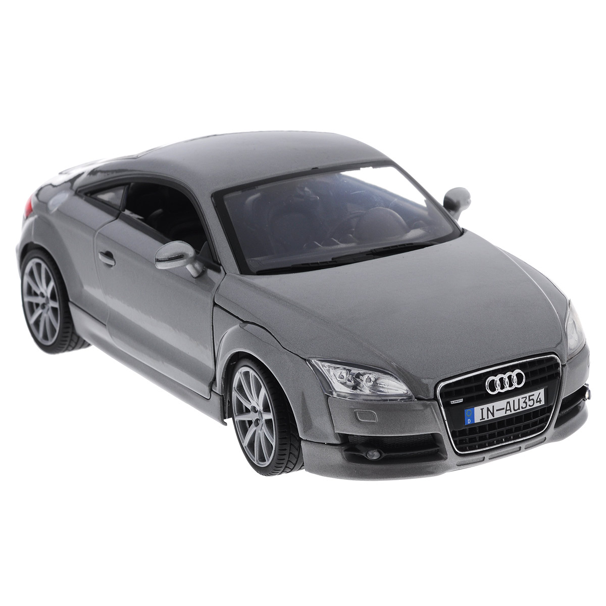 MotorMax Модель автомобиля Audi TT Coupe цвет серый73177серый MotorMax Модель автомобиля Audi TT Coupe цвет серый73177серыйКоллекционная модель MotorMax Audi TT Coupe - миниатюрная копия настоящего автомобиля. Стильная модель автомобиля привлечет к себе внимание не только детей, но и взрослых. Это немецкое купе, без сомнения, известно всем автолюбителям. Впервые Audi TT Coupe предстала перед широкой публикой в 1994 году на франкфуртском автосалоне в качестве концепта, а в 1998 году стартовал массовый выпуск авто. Эта Audi остается актуальной и по сей день. Масштабная модель от MotorMax в точности воспроизводит немецкое авто, включая мельчайшие детали интерьера и экстерьера. Вы можете рассмотреть все, включая двигатель в моторном отсеке и приборную панель автомобиля. У автомобиля открываются двери, багажник, капот, крутятся колеса. Повышенную прочность модели обеспечивает металлический корпус, выполненный по технологии die cast. Кроме того, в оформлении использованы пластиковые элементы, а колеса обуты в резиновые шины. Такая модель станет отличным подарком не только любителю...