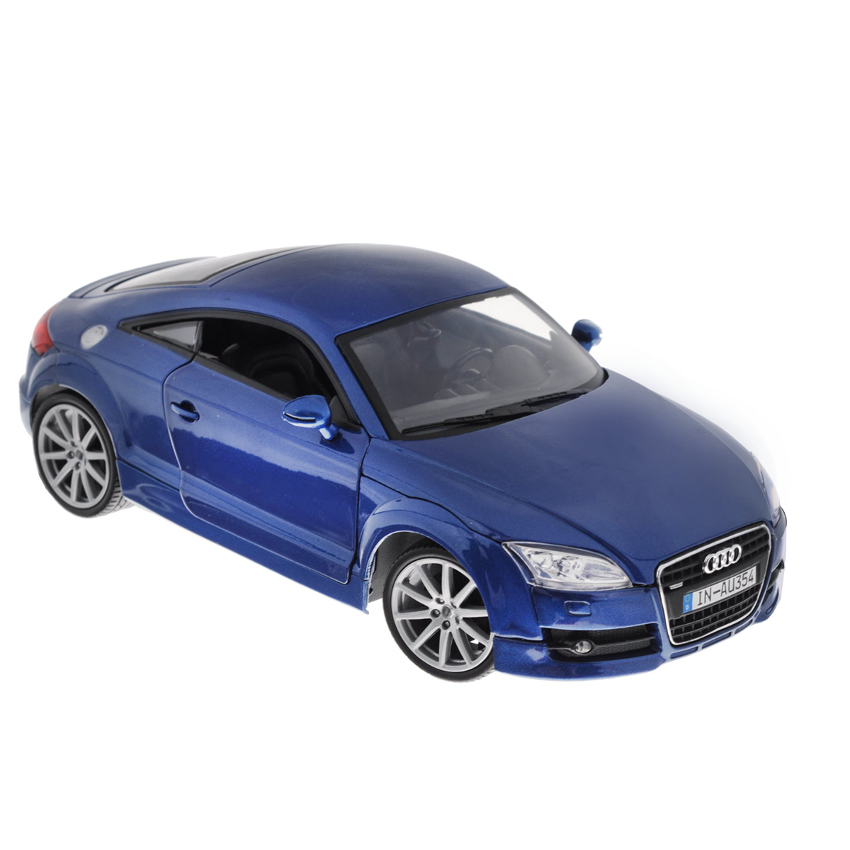 MotorMax Модель автомобиля Audi TT Coupe цвет синий73177 MotorMax Модель автомобиля Audi TT Coupe цвет синий73177Коллекционная модель MotorMax Audi TT Coupe - миниатюрная копия настоящего автомобиля. Стильная модель автомобиля привлечет к себе внимание не только детей, но и взрослых. Это немецкое купе, без сомнения, известно всем автолюбителям. Впервые Audi TT Coupe предстала перед широкой публикой в 1994 году на франкфуртском автосалоне в качестве концепта, а в 1998 году стартовал массовый выпуск авто. Эта Audi остается актуальной и по сей день. Масштабная модель от MotorMax в точности воспроизводит немецкое авто, включая мельчайшие детали интерьера и экстерьера. Вы можете рассмотреть все, включая двигатель в моторном отсеке и приборную панель автомобиля. У автомобиля открываются двери, багажник, капот, крутятся колеса. Повышенную прочность модели обеспечивает металлический корпус, выполненный по технологии die cast. Кроме того, в оформлении использованы пластиковые элементы, а колеса обуты в резиновые шины. Такая модель станет отличным подарком не только любителю...