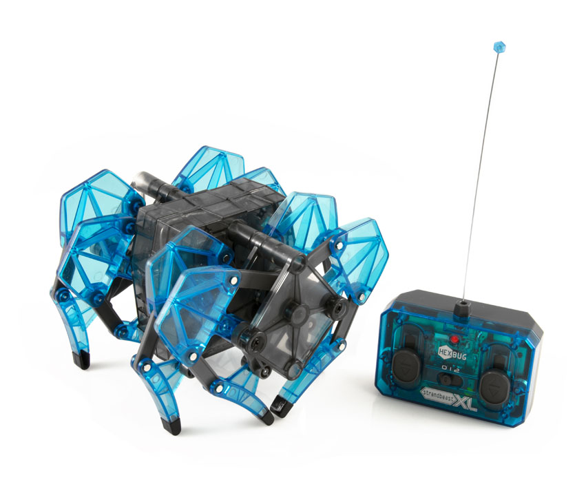 Микро-робот Hexbug Strandbeast XL, цвет: синий477-3235 Микро-робот Hexbug Strandbeast XL, цвет: синий477-3235Микро-робот Hexbug Strandbeast XL - самый необычный представитель Hexbug, который стал крупнее в 1,5 раза! От остальных сородичей его отличают инопланетный внешний вид, удивительная форма, стиль передвижения. Микро-робот способен плавно передвигаться и поворачиваться на 360° благодаря своему необычному строению. При нажатии правой кнопки, будут двигаться 4 правые ноги, а при нажатии левой - 4 левые ноги. Направлять микро-робота можно при помощи пульта радиоуправления. Hexbug Strandbeast XL - игрушка, которая удивит и обрадует вашего ребенка. Микро-робот работает от 3 батареек типа AAA (не входят в комплект). Пульт радиоуправления работает от 1 батарейки Крона 9V (не входит в комплект). Гарантия: 15 дней.