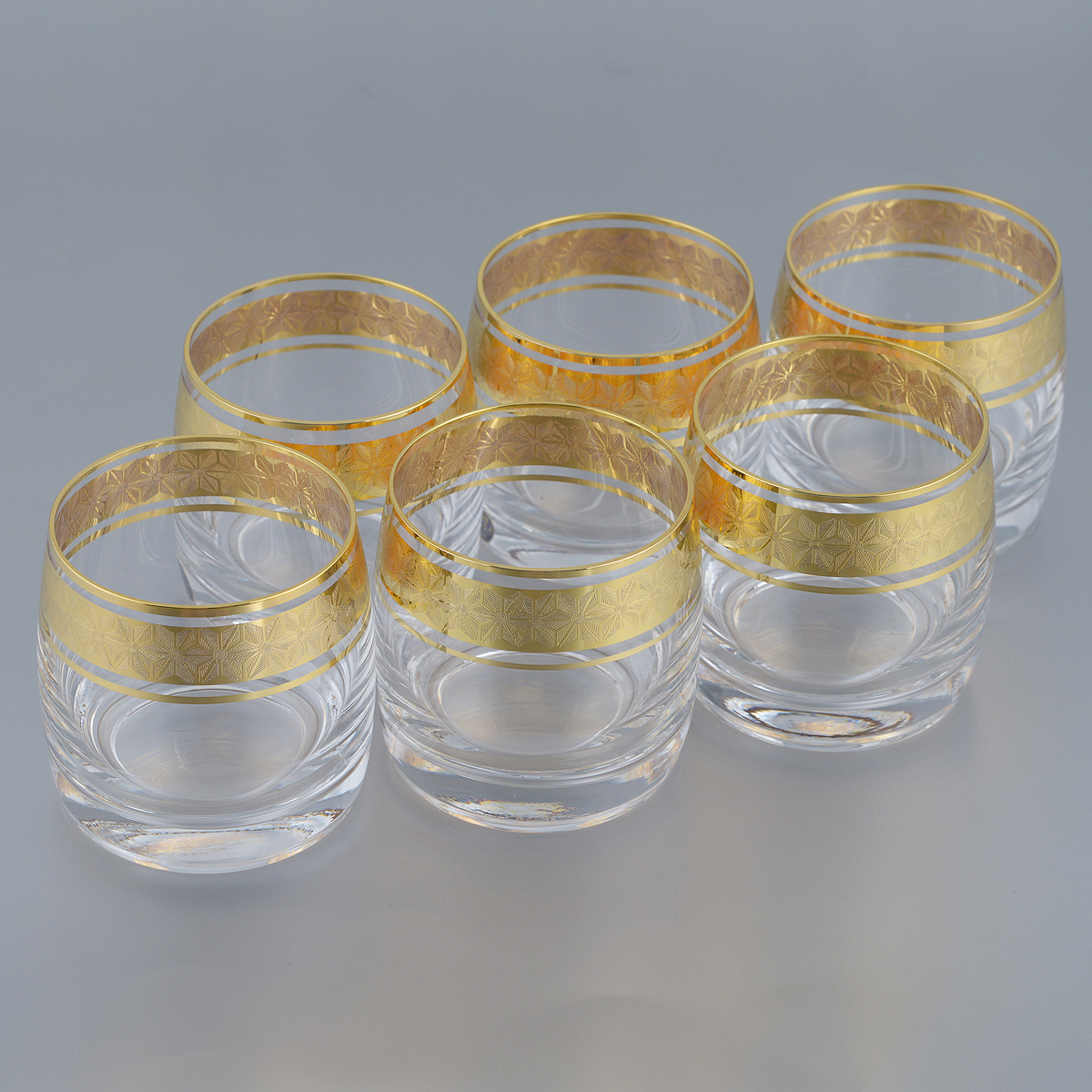 Набор стаканов Bohemia Crystal Ideal, 230 мл, 6 шт726334 Набор стаканов Bohemia Crystal Ideal, 230 мл, 6 шт726334Набор Bohemia Crystal Ideal состоит из шести стаканов. Изделия выполнены из высококачественного стекла. Стаканы имеют прозрачную поверхность и декорированы позолоченной окантовкой с орнаментом. Изделия излучают приятный блеск и издают мелодичный звон. Набор стаканов Bohemia Crystal Ideal прекрасно оформит интерьер кабинета или гостиной и станет отличным дополнением бара. Такой набор также станет хорошим подарком к любому случаю. Объем стакана: 230 мл. Диаметр стакана (по верхнему краю): 6,5 см. Высота стакана: 7 см.