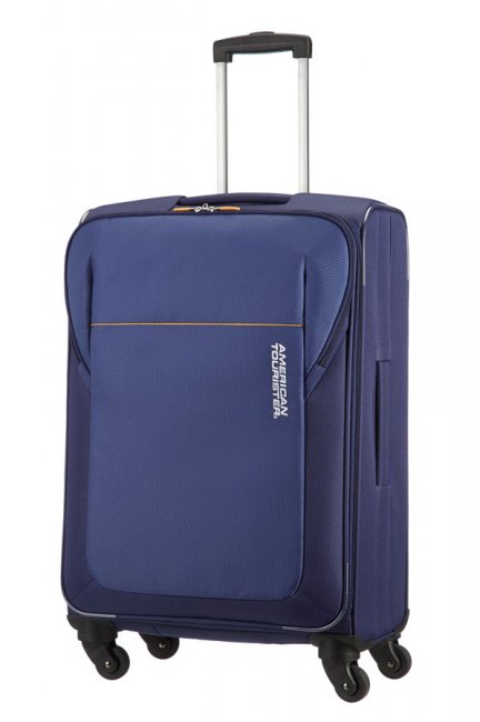 Чемодан American Tourister San Francisco, цвет: синий, 61 л. 84A*0100384A*01003 Чемодан American Tourister San Francisco, цвет: синий, 61 л. 84A*0100384A*01003Чемодан American Tourister San Francisco прекрасно подойдет для путешествий. Выполнен из плотного полиэстера, материал внутренней отделки - атласная полиэстеровая ткань серого цвета. Чемодан очень вместителен, он содержит продуманную внутреннюю и внешнюю организацию. Имеется одно большое отделение, которое закрывается по периметру на застежку-молнию с двумя бегунками. Внутри содержится большой отдел для одежды с багажными ремнями на пластиковых замках-защелках, а также сетчатый карман на молнии для различных аксессуаров. С внешней стороны расположен карман на молнии для мелких вещей и документов. Для удобной перевозки чемодан оснащен четырьмя маневренными колесами, которые обеспечивают легкость перемещения в любом направлении. Телескопическая ручка выдвигается нажатием на кнопку и фиксируется в одном положении. Сверху, снизу и сбоку предусмотрены ручки для поднятия чемодана. Чемодан American Tourister San Francisco идеально подходит для поездок и путешествий. Он...