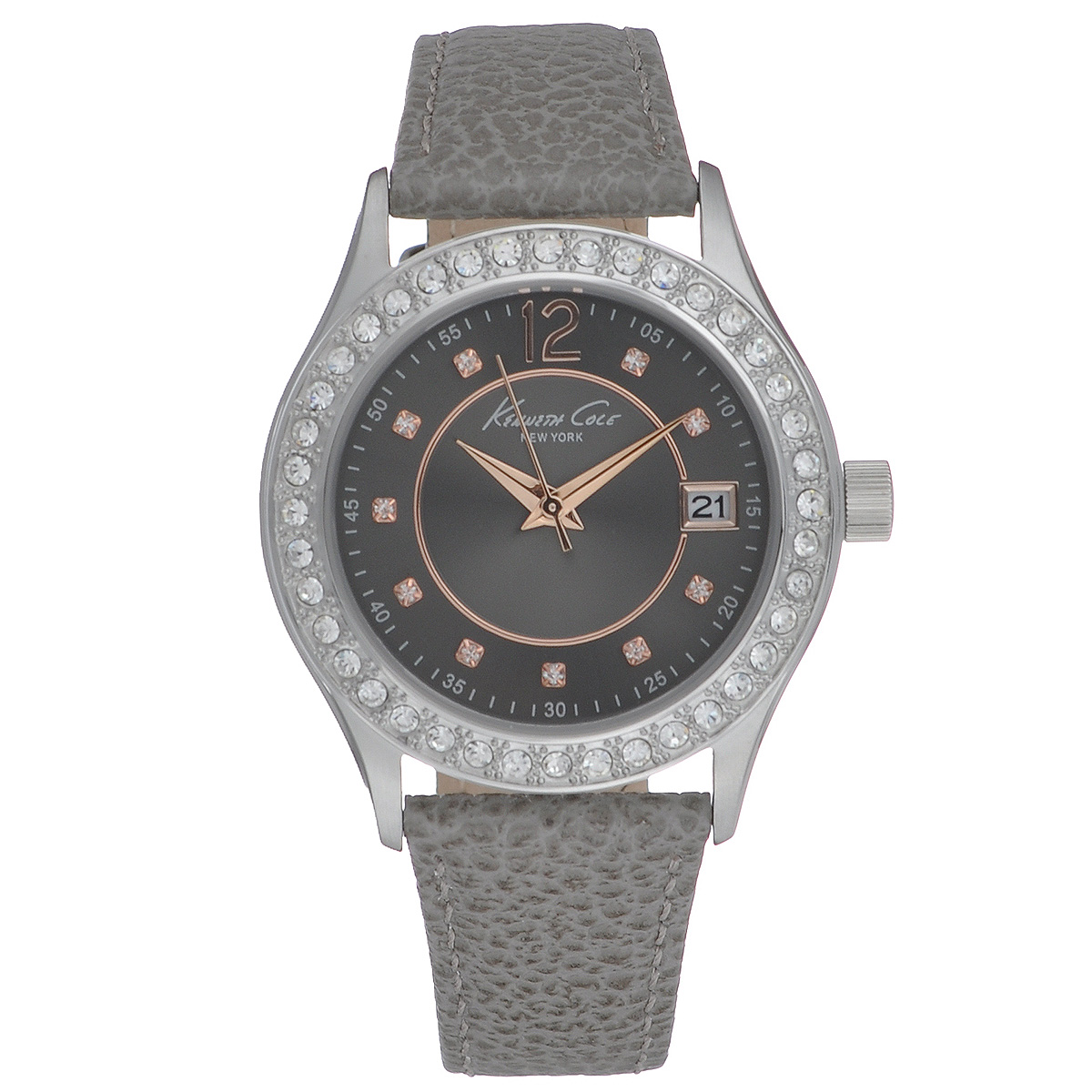Часы женские наручные Kenneth Cole, цвет: серый. 1002085210020852 Часы женские наручные Kenneth Cole, цвет: серый. 1002085210020852Наручные женские часы Kenneth Cole произведены опытными специалистами из материалов самого высокого качества на базе новейших технологий. Часы оснащены точным кварцевым механизмом. Водонепроницаемый корпус часов выполнен из нержавеющей стали и защищен минеральным стеклом. Ремешок выполнен из натуральной кожи с декоративным тиснением и оснащен классической застежкой. Циферблат круглой формы оснащен отметками в виде страз и тремя стрелками - часовой, минутной и секундной. Корпус инкрустированы стразами. Часы имеют дополнительную функцию - индикатор даты. Часы укомплектованы в фирменную коробку с названием бренда.
