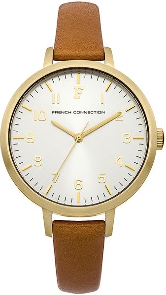 Часы наручные женские French Connection, цвет: золотой, коричневый. FC1248TFC1248T Часы наручные женские French Connection, цвет: золотой, коричневый. FC1248TFC1248TСтильные женские наручные часы French Connection идеально подойдут для человека, ценящего качественные и практичные вещи. Корпус выполнен из нержавеющей стали с IP покрытием золотистого цвета. Циферблат изделия оформлен арабскими цифрами, отметками, часовой, минутной и секундной стрелками, и дополнен логотипом French Connection. Часы оснащены кварцевым механизмом Miyota PC21 и устойчивым к царапинам минеральным стеклом. Модель обладает степенью влагозащиты 3 atm. Изделие дополнено ремешком из натуральной кожи, позволяющим максимально комфортно и быстро снимать и одевать часы при помощи пряжки. Часы поставляются на специальной подушечке в стильной коробке с логотипом French Connection. Элегантные женские часы French Connection благодаря нейтральному цветовому оформлению подойдут как к повседневной одежде, так и к деловому костюму.