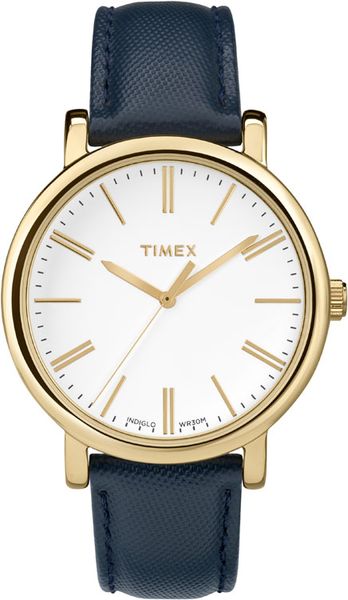 Часы наручные женские Timex, цвет: золотистый, синий. TW2P63400TW2P63400 Часы наручные женские Timex, цвет: золотистый, синий. TW2P63400TW2P63400Стильные женские наручные часы Timex выполнены из нержавеющей стали с золотистым покрытием. Циферблат изделия оформлен отметками, часовой, минутной и секундной стрелками. Также циферблат дополнен логотипом Timex. Часы оснащены кварцевым механизмом, устойчивым к царапинам минеральным стеклом и подсветкой циферблата Indiglo. Модель обладает степенью влагозащиты 3 atm. Изделие дополнено ремешком из натуральной с тиснением, позволяющим максимально комфортно и быстро снимать и одевать часы при помощи пряжки. Часы поставляются на специальной подушечке в стильной коробке с логотипом Timex. Стильные часы станут отличным дополнением к вашему образу.