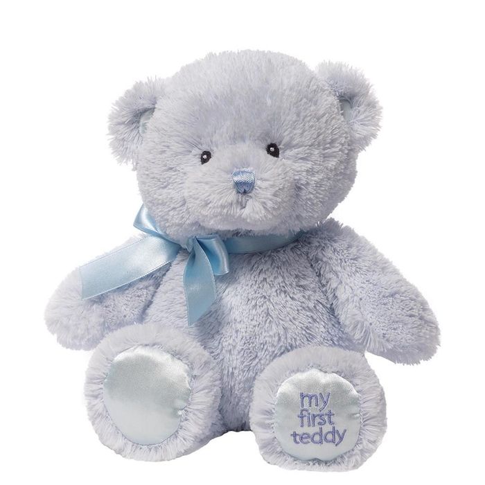 Игрушка мягкая Gund My First Teddy, цвет: голубой, 27 см. 40439504043950 Игрушка мягкая Gund My First Teddy, цвет: голубой, 27 см. 40439504043950Очаровательная мягкая игрушка Мой первый мишка не оставит вас равнодушным и вызовет улыбку у каждого, кто ее увидит. Игрушка выполнена из голубого полиэстера в виде милого медвежонка с бантиком на шее. Милые, мягкие и безопасные, игрушки фирмы Gund отличаются реалистичным внешним видом, напоминающим настоящего питомца. Только посмотрите на эту милую мордашку, которая так приветливо смотрит на вас. Разве можно устоять перед ее обаянием? Конечно нет, да и не нужно! Такая игрушка вызывает умиление не только у детей, но и у взрослых. Поэтому она станет отличным подарком не только ребенку, но и друзьям!