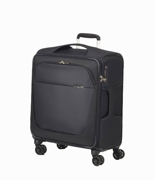 Чемодан Samsonite B-Lite 3, цвет: черный, 52 л39D*09004 Чемодан Samsonite B-Lite 3, цвет: черный, 52 л39D*09004Чемодан Samsonite B-Lite 3 прекрасно подойдет для путешествий. Материал внешней отделки - плотный текстиль (нейлон 400Den и полиэстер 450Den), внутренняя отделка - полиэстеровая ткань. Чемодан очень вместителен, он содержит продуманную внутреннюю и внешнюю организацию. Имеется одно большое отделение, которое закрывается по периметру на застежку-молнию с двумя бегунками. Внутри содержится большой отдел для одежды с перекрещивающимися багажными ремнями, соединяющимися при помощи пластикового карабина. На крышке с внутренней стороны расположен сетчатый карман на молнии для различных аксессуаров. Снаружи имеется большой карман на молнии. Для удобной перевозки чемодан оснащен четырьмя маневренными колесами, которые обеспечивают легкость перемещения в любом направлении. Телескопическая ручка выдвигается нажатием на кнопку и фиксируется в 4 положениях, поэтому может быть отрегулирована под рост пользователя. Сбоку и сверху предусмотрены ручки для поднятия...
