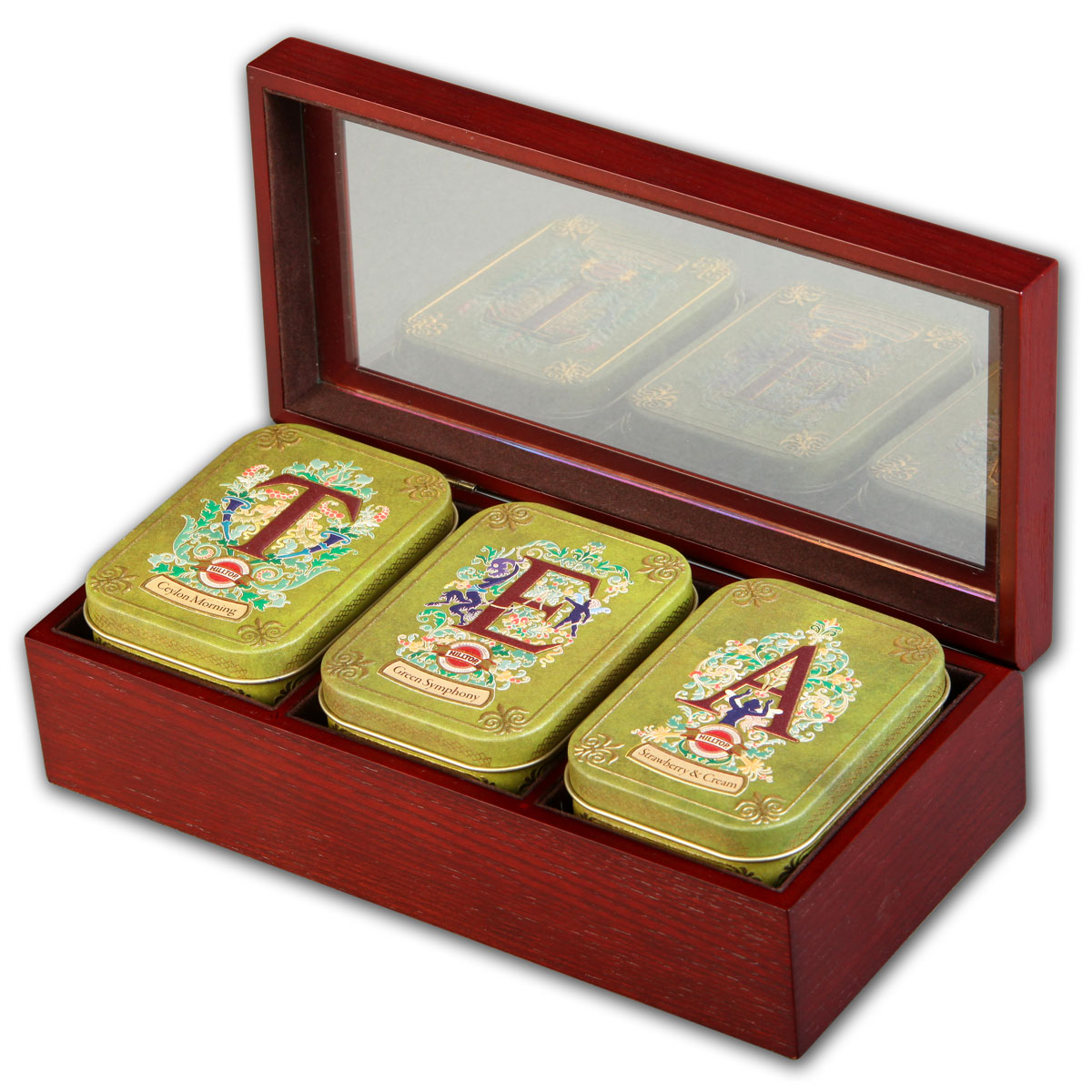 Hilltop Tea набор зеленого и черного листового чая в подарочной шкатулке, 150 г4607099303072 Hilltop Tea набор зеленого и черного листового чая в подарочной шкатулке, 150 г4607099303072Hilltop Tea - все, что нужно для удовольствия от чаепития. Деревянная шкатулка со стеклянной крышкой скрывает в себе три жестяные чайницы с великолепными вкусами! Отличный подарок для истинных ценителей чая. Цейлонское утро — классический цейлонский черный чай с терпким вкусом, мягким ароматом и тонизирующими свойствами. Отлично дополняет завтрак или праздничный сладкий стол. Зеленая симфония — китайский зеленый чай с добавлением лепестков календулы и мальвы и с ароматом тропического манго. Земляника со сливками — крупнолистовой черный чай с листьями и плодами земляники, и со вкусом свежих сливок. Классика ароматизированных чаев. Попробуйте охлажденным, с добавлением кусочков льда!