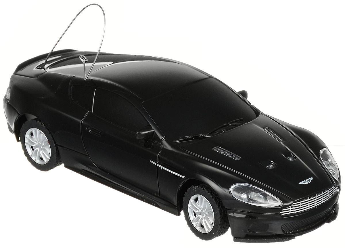 Rastar Радиоуправляемая модель Aston Martin DBS Coupe цвет черный45200_черный Rastar Радиоуправляемая модель Aston Martin DBS Coupe цвет черный45200_черныйРадиоуправляемая модель Rastar Aston Martin DBS Coupe станет отличным подарком любому мальчику! Все дети хотят иметь в наборе своих игрушек ослепительные, невероятные и крутые автомобили на радиоуправлении. Тем более, если это автомобиль известной марки с проработкой всех деталей, удивляющий приятным качеством и видом. Одной из таких моделей является автомобиль на радиоуправлении Rastar Aston Martin DBS Coupe. Это точная копия настоящего авто в масштабе 1:43. Авто обладает неповторимым провокационным стилем. Потрясающая маневренность, динамика и покладистость - отличительные качества этой модели. Возможные движения: вперед, назад, вправо, влево, остановка. Пульт управления работает на частоте 27 MHz. Для работы игрушки необходимы 2 батарейки типа ААА (не входят в комплект). Для работы пульта управления необходимы 2 батарейки типа АА (не входят в комплект).