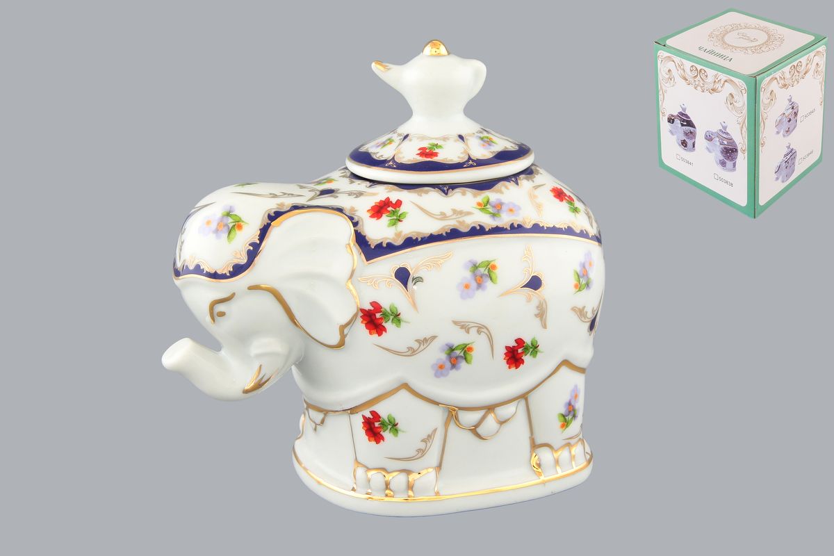 Чайница Elan Gallery Слон. Цветочек, 350 мл503846 Чайница Elan Gallery Слон. Цветочек, 350 мл503846Чайница Elan Gallery Слон. Цветочек, изготовленная из высококачественной керамики, идеально подойдет для хранения вашего любимого сорта чая. Изделие выполненное в виде слона, оформлено оригинальным цветочным узорам и изображениям бабочек. Крышка декорирована оригинальной ручкой в виде чайника. Специальная силиконовая вставка на крышке не даст потерять чаю свой аромат. Такая чайница украсит интерьер вашей кухни и подчеркнет прекрасный вкус хозяина, а также станет отличным подарком к любому празднику. Размер чайницы (с учетом крышки): 12 см х 8 см х 11 см. Диаметр горлышка: 4 см.