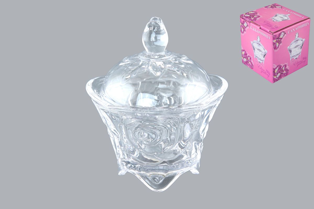 Сахарница Elan Gallery Розы, с крышкой, 100 мл890007 Сахарница Elan Gallery Розы, с крышкой, 100 мл890007Компактная сахарница на ножках с рисунком из роз изготовлена из прозрачного стекла. Придаст легкость и воздушность сервировке стола и создаст особую атмосферу праздника. Сахар, мед, изюм, орехи будут необыкновенно красиво смотреться в ней, и вы всегда можете увидеть, сколько продукта осталось в емкости. Не важно, какая у вас посуда - в цветочек, белая, цветная, в горошек или полоску, посуда из стекла подойдет к любой. Диаметр сахарницы (по верхнему краю): 9 см. Диаметр основания: 5,5 см. Высота сахарницы (без учета крышки): 6,5 см. Высота сахарницы (с учетом крышки): 11,5 см. Объем сахарницы: 100 мл.