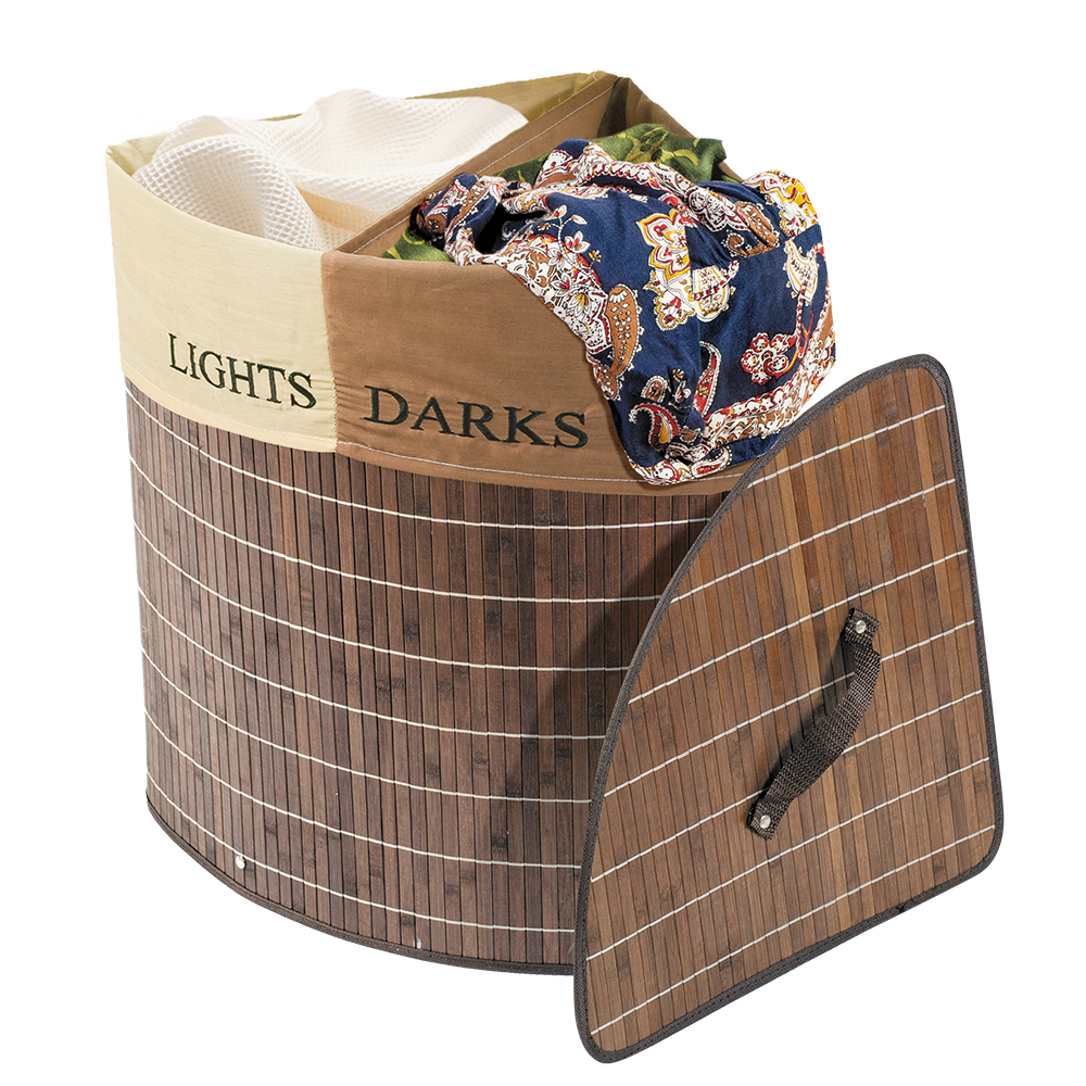 Корзина для белья Tatkraft Monako, угловая, цвет: коричневый, 35 см х 35 см х 50 см11854 Корзина для белья Tatkraft Monako, угловая, цвет: коричневый, 35 см х 35 см х 50 см11854Уникальная угловая корзина для белья Tatkraft Monako изготовлена из натурального бамбука и имеет складную конструкцию. Не боится влаги. Натуральный бамбук обладает рядом положительных качеств: антибактериальный, гиппоаллергенный, износостойкий, дезодорирует. Внутренний чехол корзины разделен на две секции: для темного и светлого белья. Оригинальная корзина не занимает много места, легко складывается. Натуральная, бамбуковая корзина Tatkraft Monako станет нужным и практичным аксессуаром в любой ванной комнате. Объем: 48 л. Размер: 35 см х 35 см х 50 см.