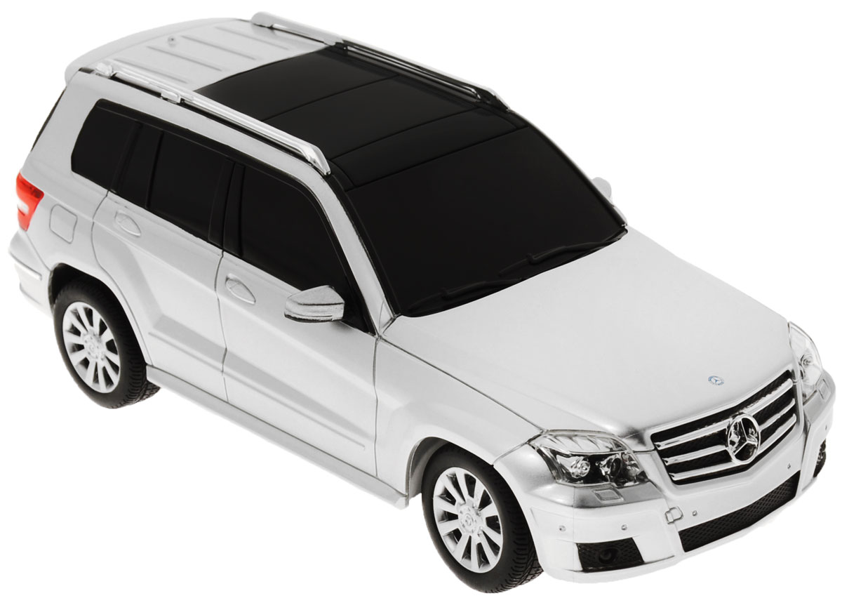 Rastar Радиоуправляемая модель Mercedes-Benz GLK-Class цвет серебристый32100_серебристый Rastar Радиоуправляемая модель Mercedes-Benz GLK-Class цвет серебристый32100_серебристыйРадиоуправляемая модель Rastar Mercedes-Benz GLK-Class станет отличным подарком любому мальчику! Все дети хотят иметь в наборе своих игрушек ослепительные, невероятные и крутые автомобили на радиоуправлении. Тем более, если это автомобиль известной марки с проработкой всех деталей, удивляющий приятным качеством и видом. Одной из таких моделей является автомобиль на радиоуправлении Rastar Mercedes-Benz GLK-Class. Это точная копия настоящего авто в масштабе 1:24. Возможные движения: вперед, назад, вправо, влево, остановка. Имеются световые эффекты. Пульт управления работает на частоте 40 MHz. Для работы игрушки необходимы 3 батарейки типа АА (не входят в комплект). Для работы пульта управления необходимы 2 батарейки типа АА (не входят в комплект).