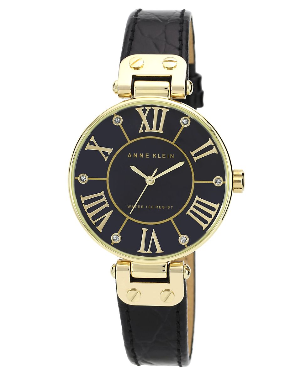 Часы наручные женские Anne Klein, цвет: черный, золотой. 1396BMBK1396BMBK Часы наручные женские Anne Klein, цвет: черный, золотой. 1396BMBK1396BMBKОригинальные женские часы Anne Klein выполнены из металлического сплава, натуральной кожи и минерального стекла. Циферблат изделия дополнен символикой бренда и стразами. Корпус часов оснащен кварцевым механизмом, имеет степень влагозащиты равную 3 atm, а также дополнен устойчивым к царапинам минеральным стеклом. Ремешок часов выполнен из натуральной кожи с тиснением под рептилию, оснащен классической пряжкой, которая позволит с легкостью снимать и надевать изделие. Часы поставляются в фирменной упаковке. Часы Anne Klein подчеркнут изящность женской руки и отменное чувство стиля у их обладательницы.