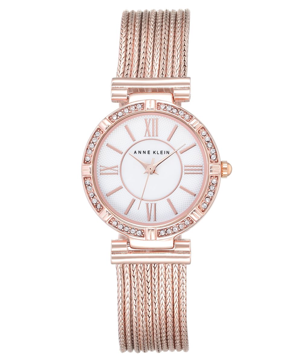 Часы наручные женские Anne Klein, цвет: белый, золотой. 2144MPRG2144MPRG Часы наручные женские Anne Klein, цвет: белый, золотой. 2144MPRG2144MPRGЭлегантные женские часы Anne Klein выполнены из металлического сплава и минерального стекла. Циферблат изделия дополнен символикой бренда и вставкой из перламутра. Корпус оформлен стразами Svarowski. Корпус часов оснащен кварцевым механизмом, имеет степень влагозащиты равную 3 atm, а также дополнен устойчивым к царапинам минеральным стеклом. Браслет часов выполнен из десяти цепочек и оснащен складным замком, который позволит с легкостью снимать и надевать изделие, а также регулировать длину. Часы поставляются в фирменной упаковке. Часы Anne Klein подчеркнут изящность женской руки и отменное чувство стиля у их обладательницы.