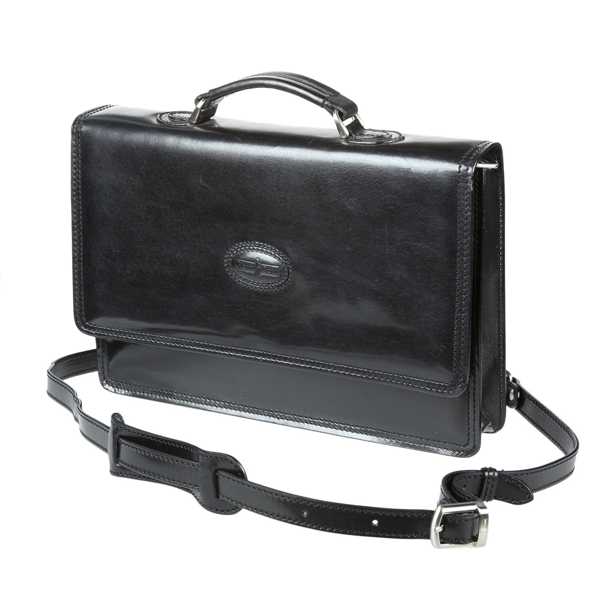 Портфель Gianni Conti муж., цвет: черный. 901040 black901040 black Портфель Gianni Conti муж., цвет: черный. 901040 black901040 blackзакрывается на магнитную кнопку оснащен съемным регулируемым плечевым ремнем на карабинах внутри три небольших отдела в последнем на задней стенке карман для мобильного телефона три кармашка для пластиковых карт два держателя для авторучек карман для документов на молнии снаружи на передней стенке (под клапаном) два отдела для документов на молнии два кармашка для мелких предметов на молнии на задней стенке карман для документов на молнии