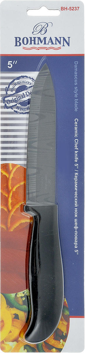 Нож Bohmann, керамический, длина лезвия 12,5 см. 5237BH5237BH Нож Bohmann, керамический, длина лезвия 12,5 см. 5237BH5237BHНож Bohmann изготовлен из высококачественной керамики черного цвета с дамасским узором. Такой нож отлично подходит для нарезки мяса, измельчения овощей, фруктов. Керамическая поверхность значительно улучшает гигиенические свойства ножа и уменьшает процесс окисления, помогая сохранить полезные свойства продукта. Он очень легкий и абсолютно не ржавеет. Эргономичная рукоятка ножа выполнена из пластика черного цвета. Керамический нож Bohmann предоставит вам все необходимые возможности в успешном приготовлении пищи. Не резать на стеклянных и металлических поверхностях. Желательно использовать пластиковые и деревянные разделочные доски.Не рубить кости и замороженные продукты. Можно мыть в посудомоечной машине. Общая длина ножа: 24,5 см.