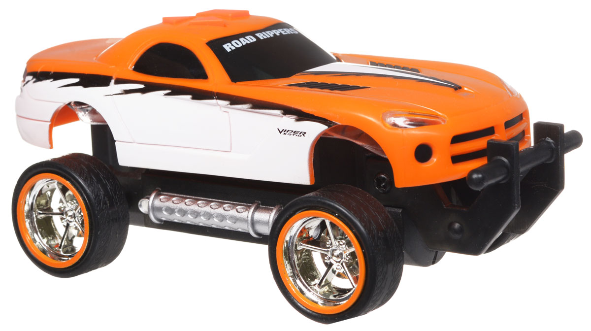Toystate Машина Road Rippers Dodge33121TS_оранжевый Toystate Машина Road Rippers Dodge33121TS_оранжевыйЯркая машинка Road Rippers со звуковыми эффектами, несомненно, понравится вашему ребенку и не позволит ему скучать. Игрушка выполнена в виде яркой гоночной машины. При нажатии на кнопки, расположенные на крыше, светятся фары, воспроизводятся звуки двигателя и включенной передачи заднего хода. Машинка обладает инерционным механизмом. Стоит откатить игрушку назад, слегка надавив на крышу, затем отпустить - и машинка стремительно поедет вперед. Ваш ребенок часами будет играть с машинкой, придумывая различные истории и устраивая соревнования. Порадуйте его таким замечательным подарком! Рекомендуется докупить 3 батарейки напряжением 1,5V типа AАА (товар комплектуется демонстрационными).