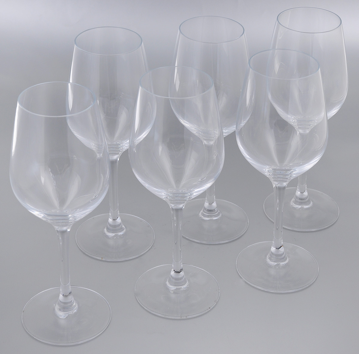 Набор фужеров для вина Luminarc Hermitage, 350 мл, 6 штH2600 Набор фужеров для вина Luminarc Hermitage, 350 мл, 6 штH2600Набор Luminarc Hermitage состоит из шести фужеров, выполненных из прочного стекла. Изделия оснащены высокими ножками. Фужеры предназначены для подачи вина. Они сочетают в себе элегантный дизайн и функциональность. Благодаря такому набору пить напитки будет еще вкуснее. Набор фужеров Luminarc Hermitage прекрасно оформит праздничный стол и создаст приятную атмосферу за романтическим ужином. Такой набор также станет хорошим подарком к любому случаю. Можно мыть в посудомоечной машине. Диаметр фужера (по верхнему краю): 5,5 см. Высота фужера: 22 см.