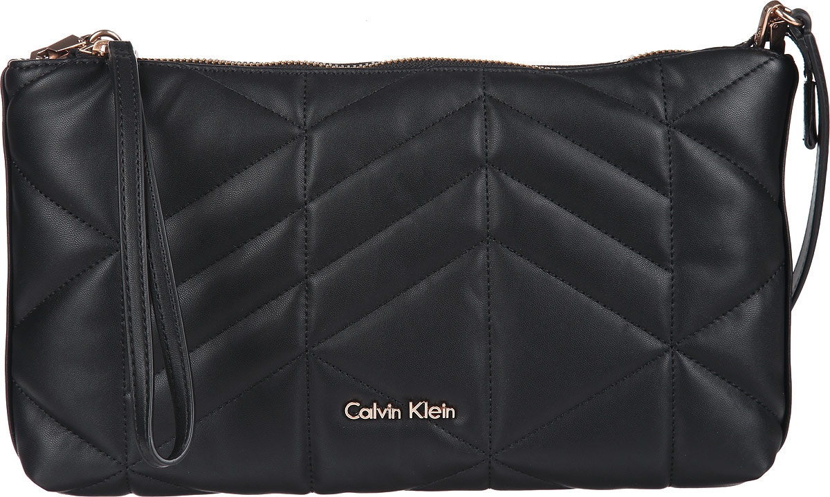 Сумка женская Calvin Klein Jeans, цвет: черный. K60K601010K60K601010 Сумка женская Calvin Klein Jeans, цвет: черный. K60K601010K60K601010Стильная сумка женская Calvin Klein Jeans выполнена из полиуретана, оформлена декоративной строчкой и металлической фурнитурой с символикой бренда. Изделие содержит одно отделение и закрывается на молнию. Внутри размещен врезной кармашек на молнии. Сумка оснащена съемным укороченным плечевым ремнем, который дополнен цепочкой. Бегунок молнии дополнен петлей на запястье. Оригинальный аксессуар от Calvin Klein Jeans позволит вам завершить образ и быть неотразимой.